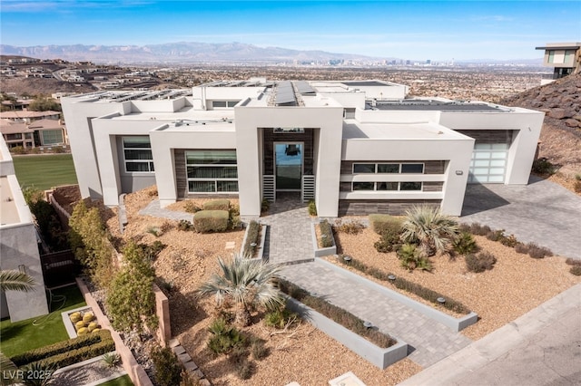 view of front of property with a mountain view