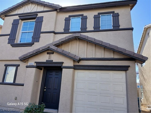 view of front of property with a garage