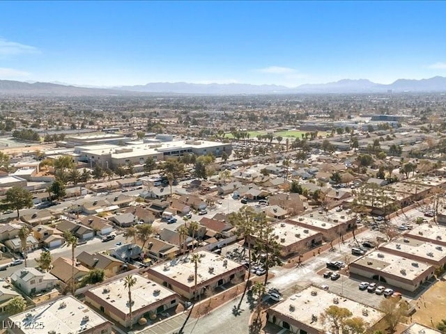 drone / aerial view featuring a mountain view