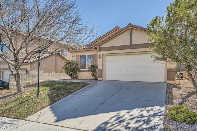 single story home with a garage