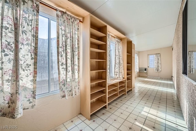 interior space featuring an AC wall unit