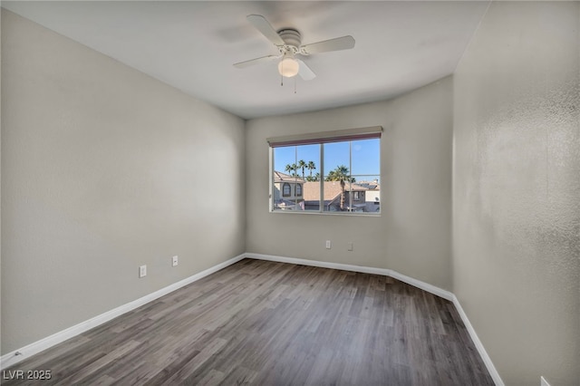 unfurnished room with hardwood / wood-style floors and ceiling fan