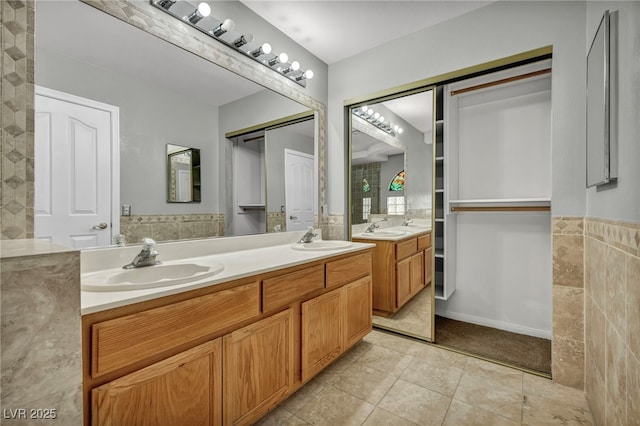 bathroom featuring tile patterned floors and vanity