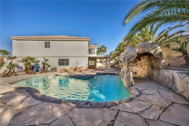 view of swimming pool with a patio area