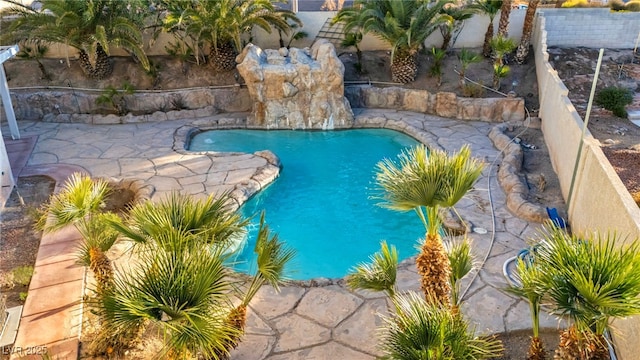 view of pool with a patio area