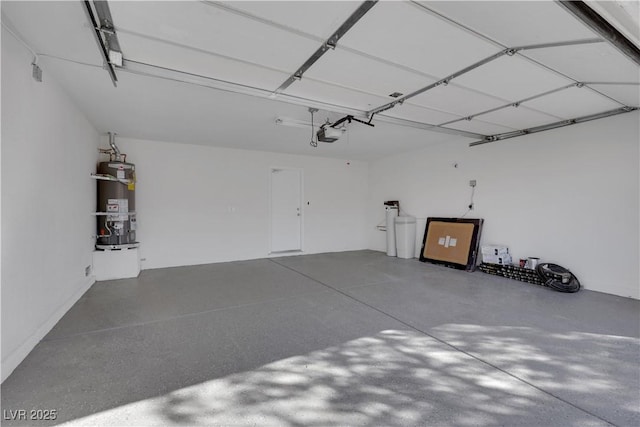 garage featuring a garage door opener and secured water heater