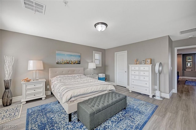 bedroom featuring hardwood / wood-style flooring