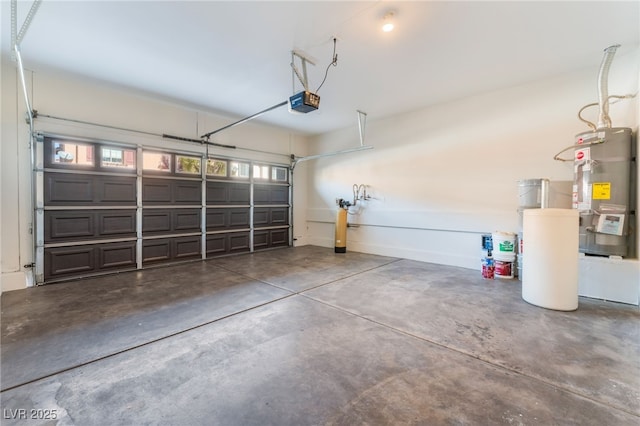 garage featuring secured water heater and a garage door opener