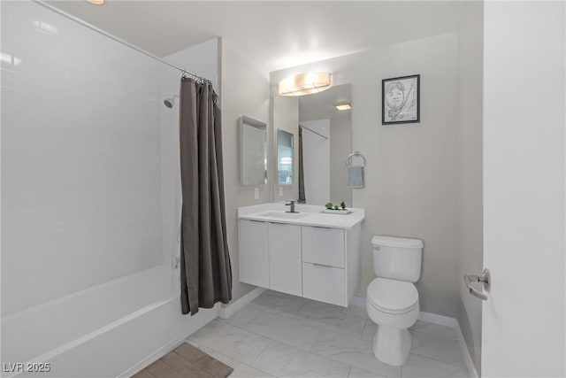 full bathroom featuring vanity, toilet, and shower / bath combo with shower curtain