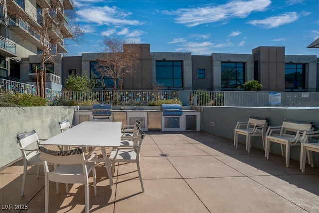 view of patio featuring area for grilling and grilling area