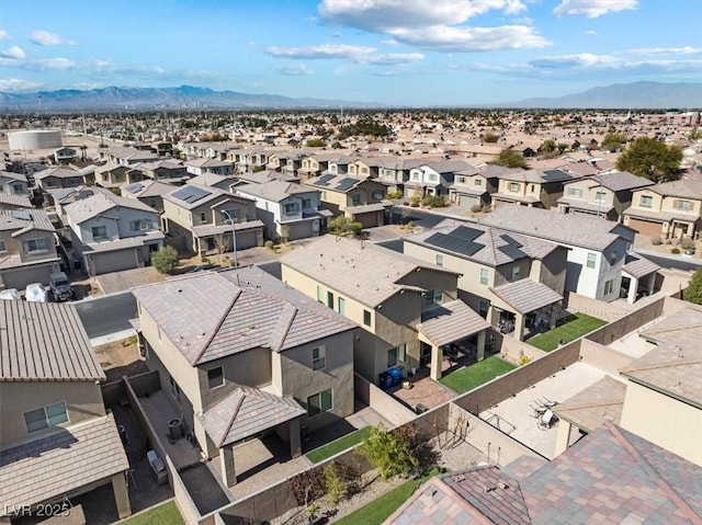 bird's eye view with a mountain view