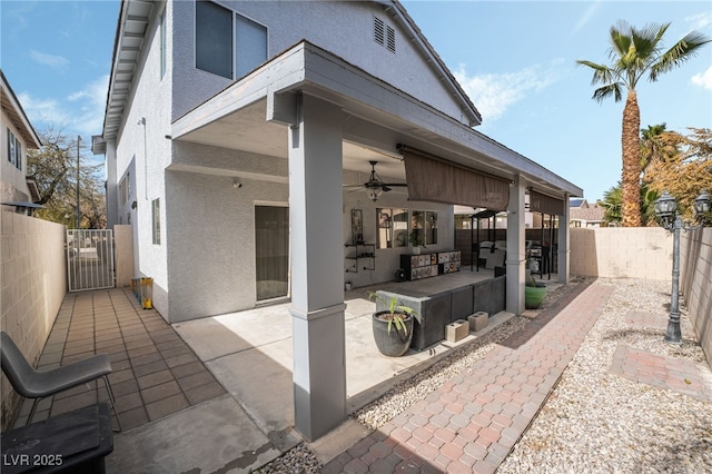 view of patio / terrace featuring ceiling fan