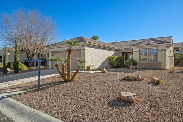 ranch-style home featuring a garage