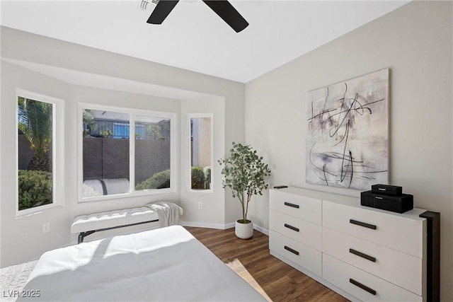 bedroom featuring dark wood-type flooring and ceiling fan