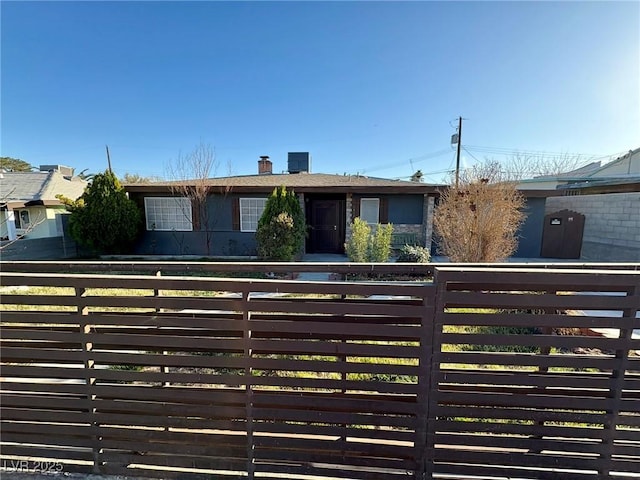 view of gate featuring fence