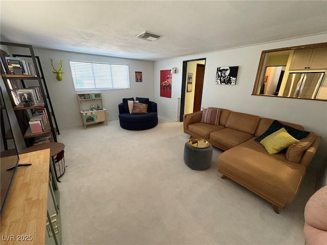 living room featuring carpet and visible vents