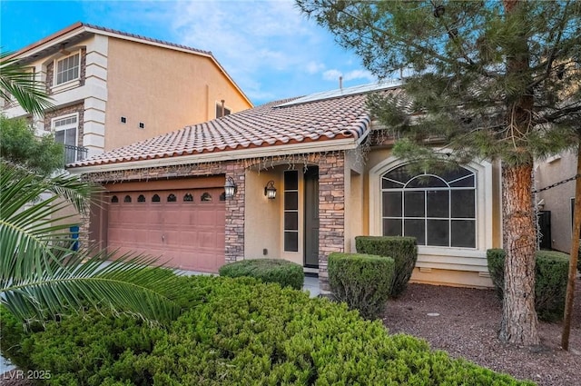 view of front of property featuring a garage