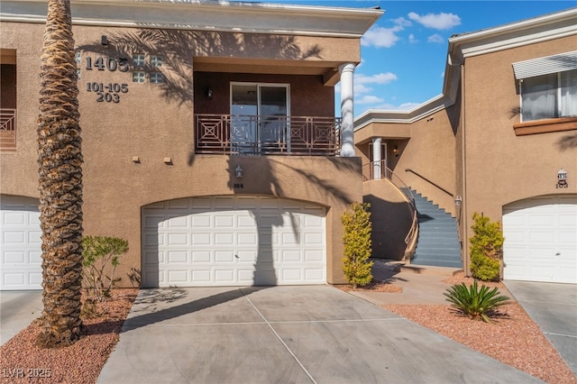 view of front of property with a garage