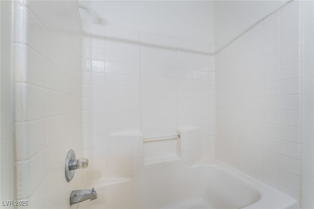 bathroom with shower / bathtub combination