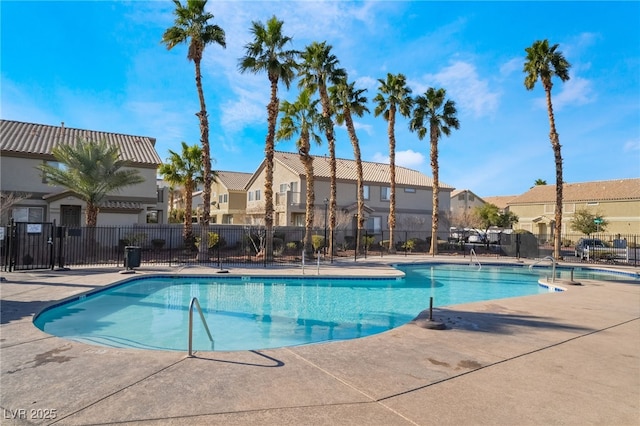 view of swimming pool with a patio area