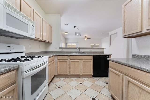 kitchen featuring sink, white appliances, light tile patterned floors, ceiling fan, and light brown cabinetry