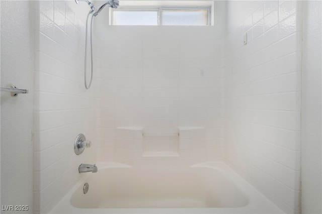 bathroom featuring washtub / shower combination