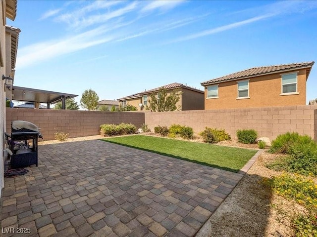 view of patio with a grill