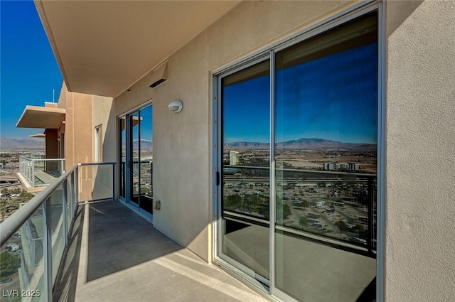 balcony featuring a mountain view