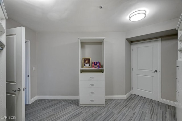 unfurnished bedroom featuring baseboards