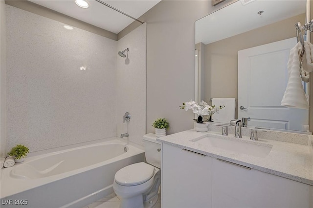 bathroom with tub / shower combination, vanity, and toilet