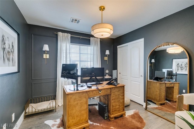 office area featuring hardwood / wood-style floors