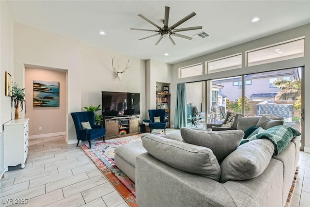 living room with ceiling fan