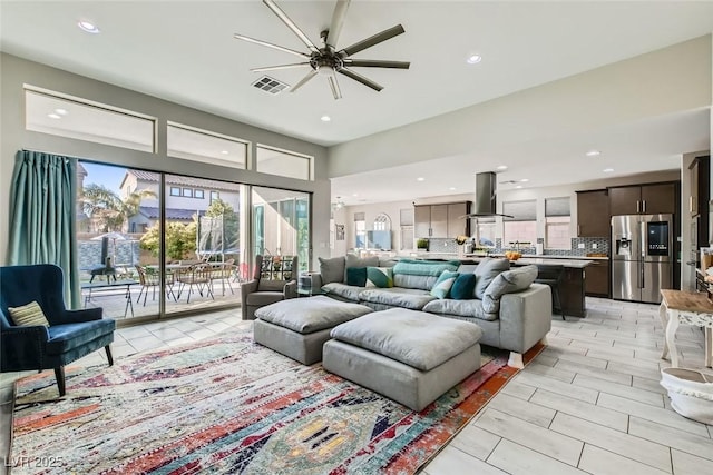 living room featuring ceiling fan