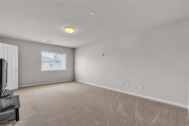 6461 Mount Eden Ave, Las Vegas, NV 89139 - unfurnished living room featuring light colored carpet, visible vents, and baseboards