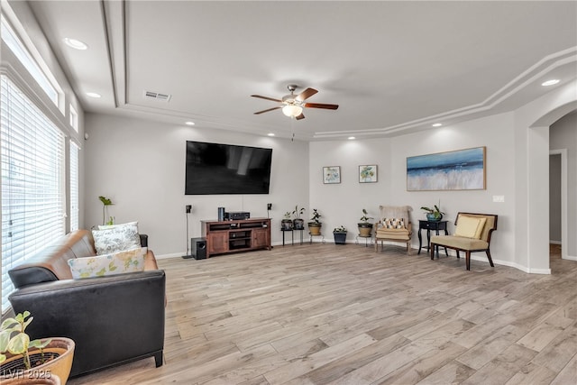 6461 Mount Eden Ave, Las Vegas, NV 89139 - living area featuring recessed lighting, ceiling fan, visible vents, arched walkways, and light wood-type flooring