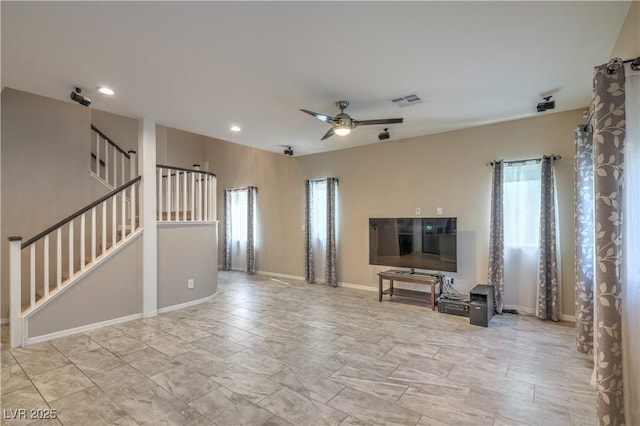 unfurnished living room featuring visible vents, baseboards, ceiling fan, stairway, and recessed lighting