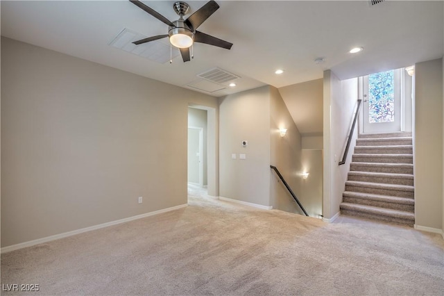 spare room with ceiling fan, recessed lighting, light carpet, visible vents, and baseboards