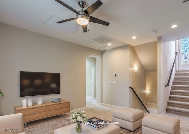 living room with visible vents, baseboards, light colored carpet, ceiling fan, and recessed lighting