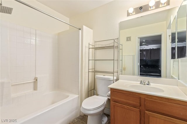 full bathroom featuring shower / tub combination, vanity, and toilet