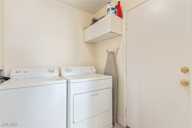 laundry room with separate washer and dryer