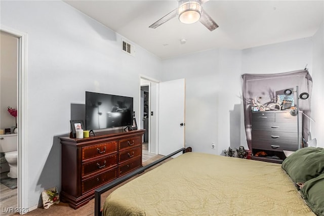 bedroom with ceiling fan and light colored carpet