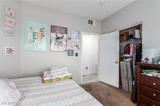 bedroom featuring a closet and carpet