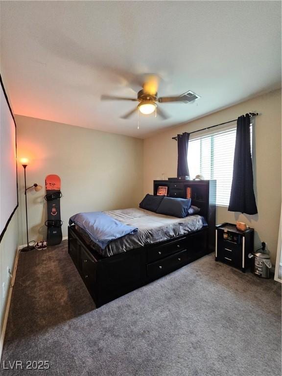 bedroom featuring ceiling fan and carpet floors