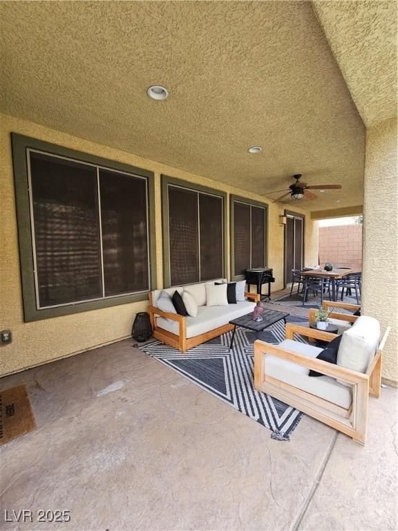 view of patio / terrace with outdoor lounge area and ceiling fan