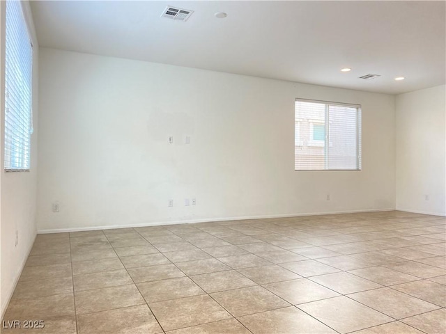 view of tiled spare room