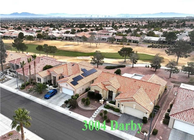 bird's eye view with a mountain view