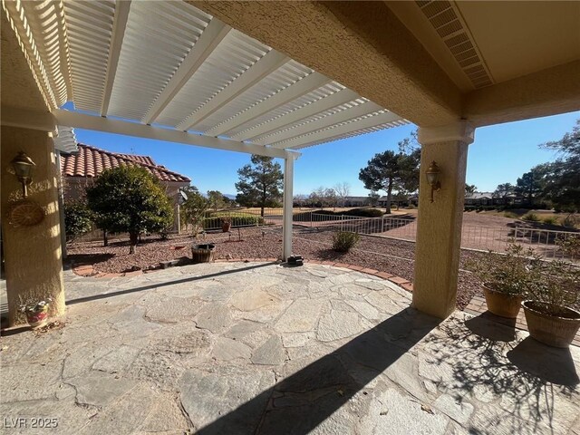 view of patio featuring a pergola