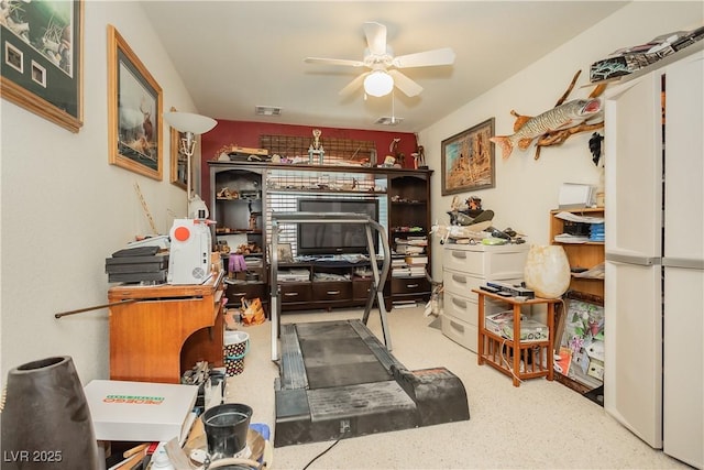 exercise area with ceiling fan