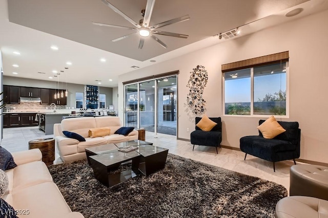 living room with ceiling fan