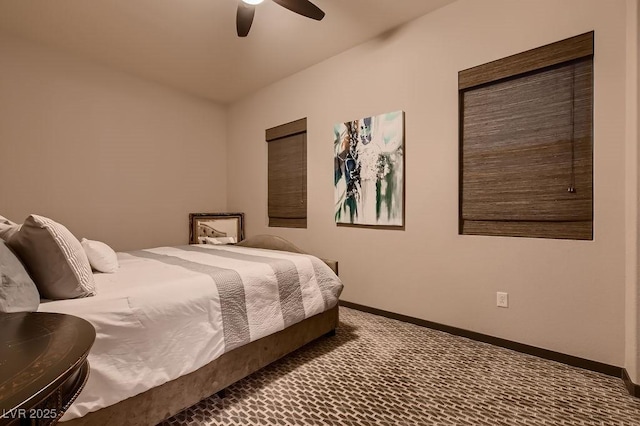 bedroom with ceiling fan and carpet flooring